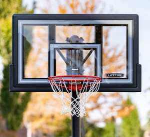 lot 7 image: Lifetime 50 in. Height Adjustable In-Ground Basketball System with Shatterproof Backboard