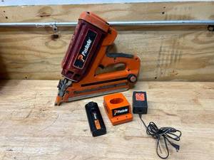 lot 25 image: PASLODE Model IMCT Cordless 30 DEG Framing Nailer with Battery, Charger and Case