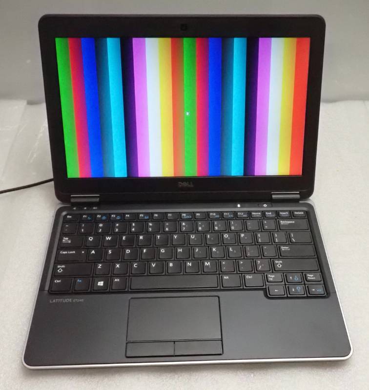 lot 34 image: Dell Latitude E7240 Notebook &nbspINTEL(R) CORE(TM) I7-4600U CPU  2.10GHZ  8GB RAM  256SSD  12.5 1366 x 768  Vent Grates on Bottom Slightly Cracked  NO OS  Includes Power Adapter
