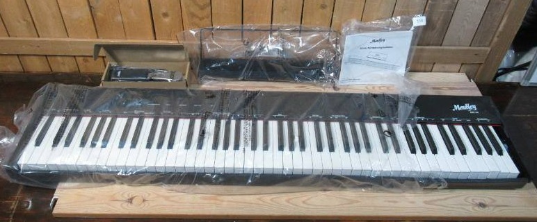 lot 110 image: Moukey Piano 88 Keys Keyboard Full-Size Digital Keyboard, Book Stand & Pedal