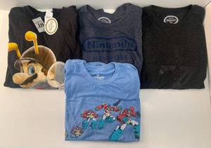 lot 96 image: Group OF Vintage Nintendo T-Shirts With Tags Including Super Mario Galaxy (L) , Nintendo New York (XL), Transformers (L) NO Tags And Zelda (L)