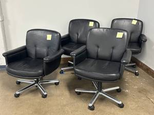 lot 57 image: Group of 4 black leather office armchairs