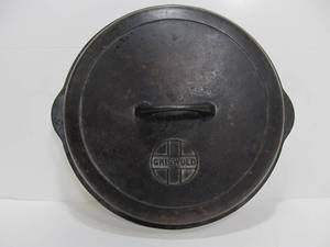 lot 51 image: Antique GRISWOLD No. 10 Self-Basting Cast Iron Lid