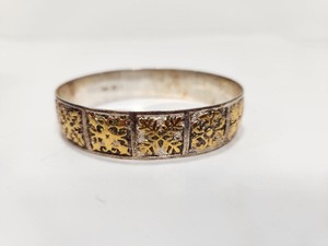 lot 92 image: Signed Sterling Silver Hawaiian Style Bangle Bracelet wGold Accents