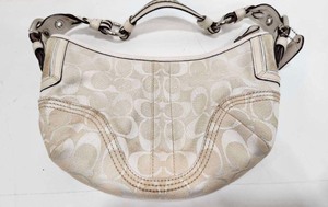 lot 143 image: Genuine COACH Purse
