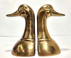 lot 144 image: Mid Century Solid Brass Duck Head Bookends