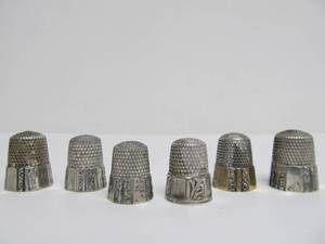 lot 73 image: Lot of 6 Antique Sterling Silver Thimbles