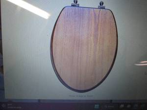 lot 24 image: Jones Stephens Decorative Wood Elon...