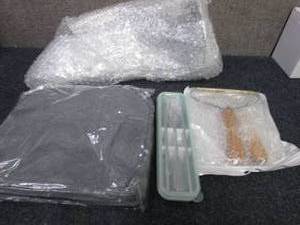 lot 104 image: Lunch Bag with Utensils, 2 Lint Rem...