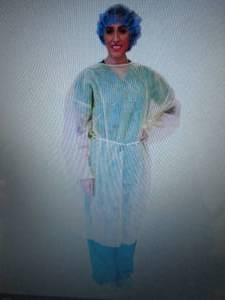 lot 147 image: Case of 100 Cover Gowns Yellow Univ...