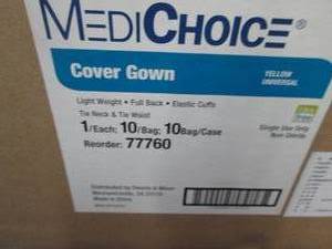 lot 186 image: Case of 100 Cover Gowns Yellow Univ...