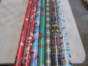 lot 234 image: 7 Rolls Christmas Wrapping Paper...