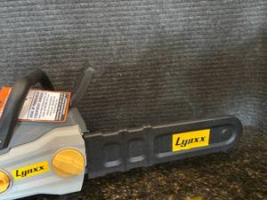 lot 25 image: Lynxx Battery Powered Chainsaw