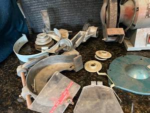 lot 23 image: 1990 Vintage Grinding Wheel with Accessories