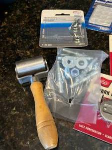 lot 36 image: Extension Cords, Mallet, Safety Glasses, and Other Assorted Garage Items