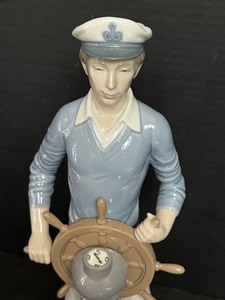 lot 25 image: Lladro Yachtsman at the Helm Porcelain Figurine - 5206