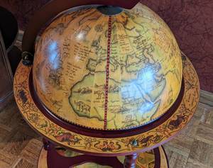lot 42 image: Vintage Style Rolling Globe Bar Cabinet