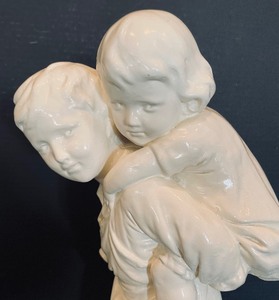 lot 356 image: Adorable Resin Piggy Back Ride Sculpture