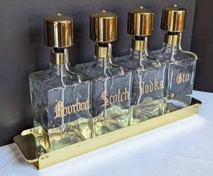 lot 35A image: Vintage Glass Pump Liquor Decanter Set
