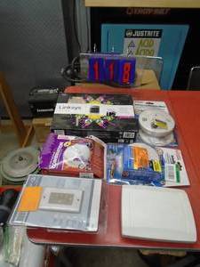 Computer router & misc electronics. As shown.