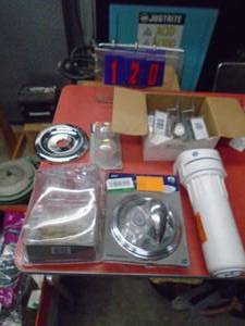 Plumbing supplies & water filter. As shown.