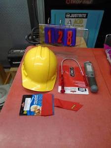 Misc tools. Hard hat, claw, flash light. As shown.