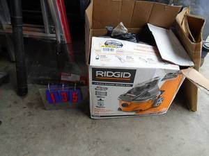 Rigid vacuum with hose for parts or repair. As shown.