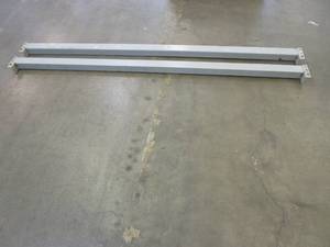 lot 12 image: 2 rails for use with teardrop racking system, Approximately 103 x 3 12 in gray - Used in warehouse - SOLD AS IS