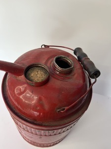 lot 56 image: Vintage Galvanized Small Metal Red Paint Gas Oil Can Wood Bail Wire Handle