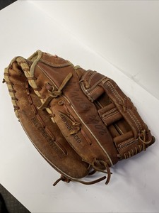 lot 77 image: Three Baseball Gloves