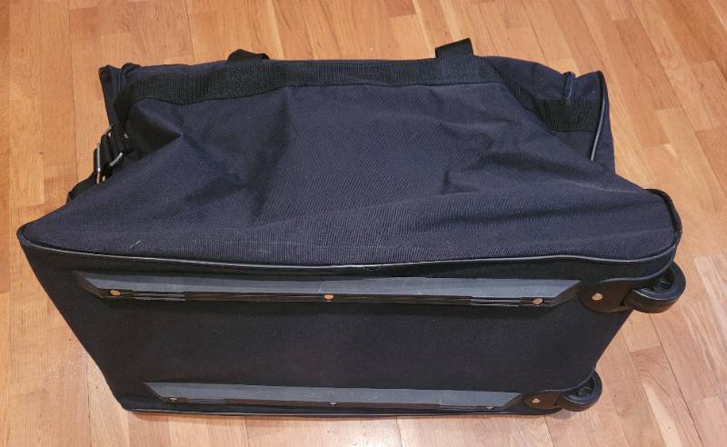 lot 13 image: Like New Ricardo Beverly Hills Black Rolling Duffle Bag