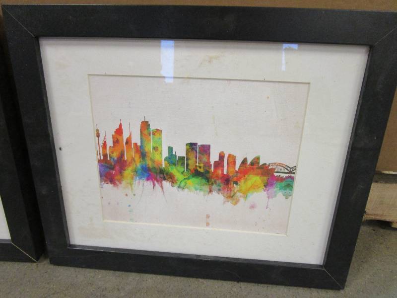 lot 618 image: Set of 2 - Colorful Wall Art Framed in Black (OUT OF PACKAGING)