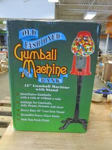 lot 698 image: Gumball Machine with Stand - 15-in. Vintage Metal and Glass Candy Dispenser Machine Coin Operated Bank in Red (OPEN BOX)