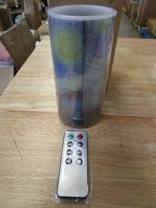 lot 881 image: Lavish Home 80-FC1008 LED Starry Night Candle with Remote Control Timer Van Gogh Art on Vanilla Scented Realistic Flickering or Steady Flameless Light-Decor (OPEN BOX)