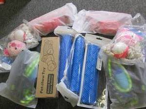 lot of dog chew toys and leashes...