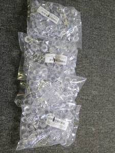 4 bags of 60 small clear crystal or...
