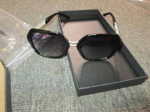 2 new womens sunglasses with cases...