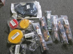 lot of dog leashes and collars...