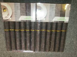 2 new sets of 4 placemats...