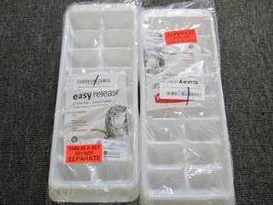 2 sets of 2 new ice cube trays...
