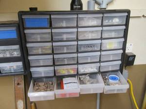lot 240 image: Content of multiple part organizers...