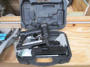 lot 292 image: 2 Air nailers, one in a case...