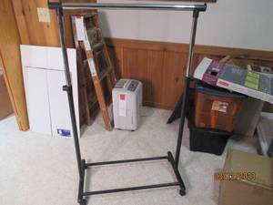 lot 40 image: Clothing rack on wheels...