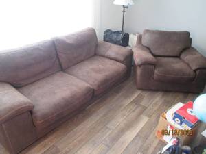 lot 97 image: Couch and oversized chair, nice uph...