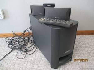 lot 114 image: Bose speaker system with remote...
