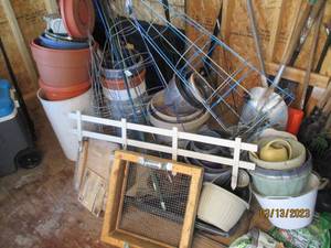 lot 129 image: Lot of planters, tomato cages, and ...