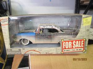 lot 147 image: Die cast 57 Chevy model car...