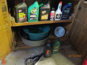 lot 181 image: Cabinet full of automotive fluids a...