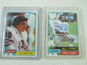 lot 121 image: 1981 Topps Dam Hampton & Billy Sims...