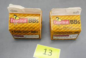 lot 13 image: Two boxes of BBs, each one is about half full